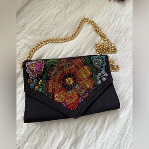 Embroidered black purse